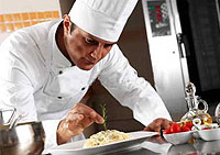 Chef preparing food in kitchen